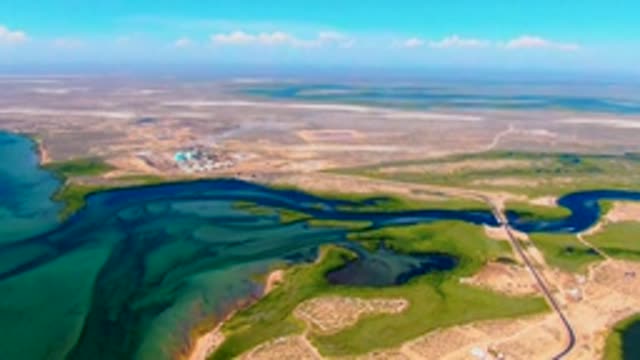 SAN CARLOS BCS MEXICO-2022: Factory Smoke Emission Over Water and Desert