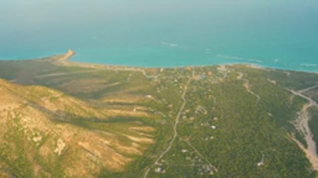 CABO PULMO LOS CABOS BCS MEXICO-2022: Vehicle Moving on Mountain Road by Ocean Coast