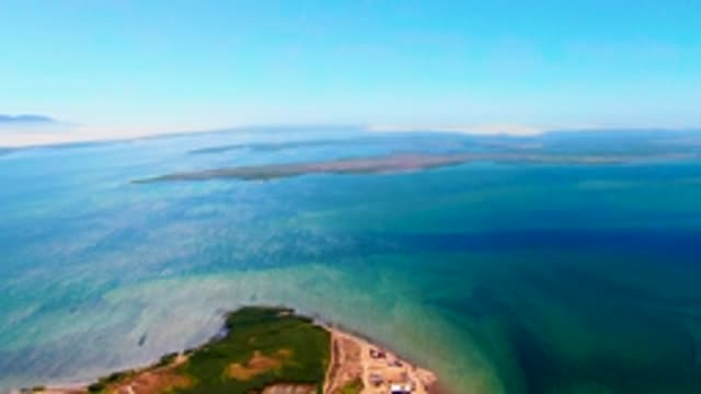 SAN CARLOS BCS MEXICO-2022: Calm Coastal Waters and Distant Landmass From Above