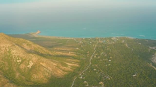 CABO PULMO LOS CABOS BCS MEXICO-2022: Coastal Mountain View with Passing Boat