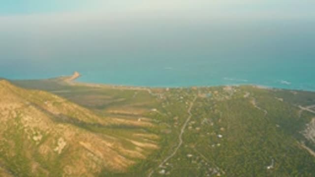 CABO PULMO LOS CABOS BCS MEXICO-2022: Hilly Coastal Landscape with Green Valleys and Ocean