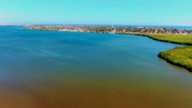 SAN CARLOS BCS MEXICO-2022: Coastal Estuary with Town and Green Shore