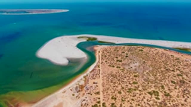 SAN CARLOS BCS MEXICO-2022: Shifting Tidal Water and Vehicle on Sandy Coast