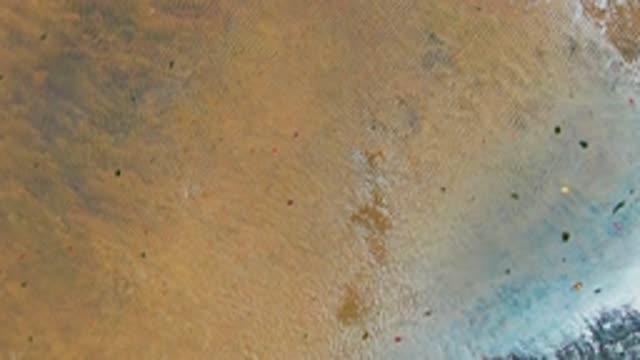 SAN CARLOS BCS MEXICO-2022: Shifting Sand Ripples and Receding Water on a Beach