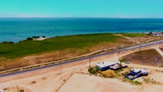 SAN CARLOS BCS MEXICO-2022: Coastal Road with Moving Vehicle