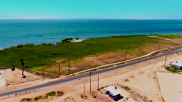 SAN CARLOS BCS MEXICO-2022: Coastal Road with Sandy Shore and Ocean