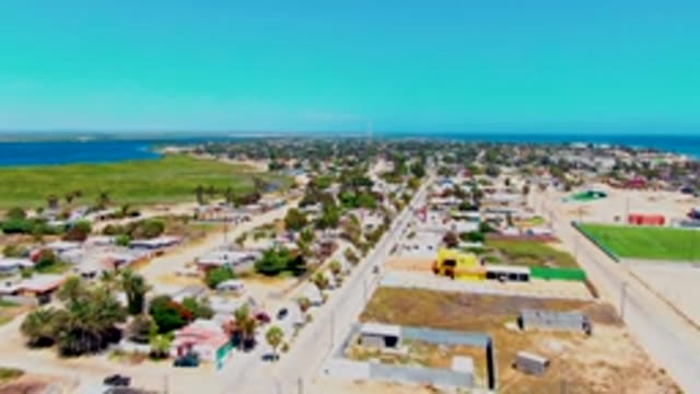 SAN CARLOS BCS MEXICO-2022: Coastal Residential Area with Road Traffic