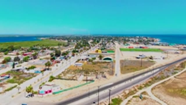SAN CARLOS BCS MEXICO-2022: Aerial Flight Over Coastal Town and Roads