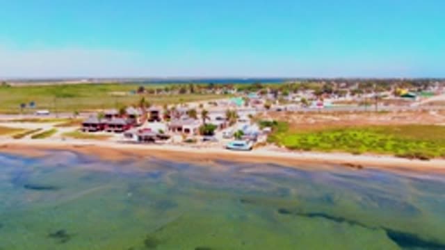 SAN CARLOS BCS MEXICO-2022: Beach and Coastal Road with Moving Vehicles