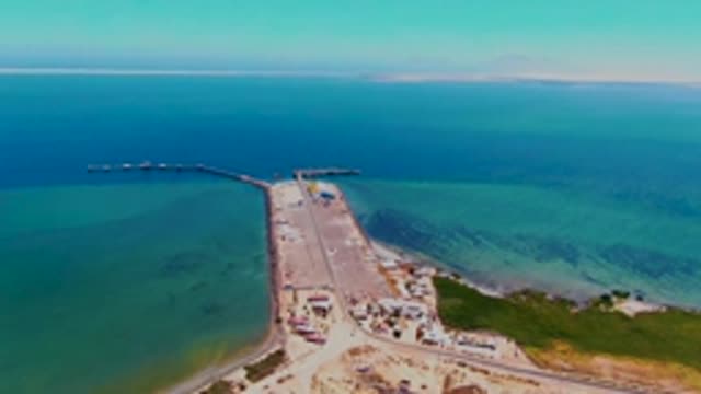 SAN CARLOS BCS MEXICO-2022: Coastal Dock with Turquoise Waters From Above