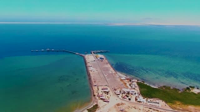 SAN CARLOS BCS MEXICO-2022: Pier in Ocean with Clear Turquoise Water