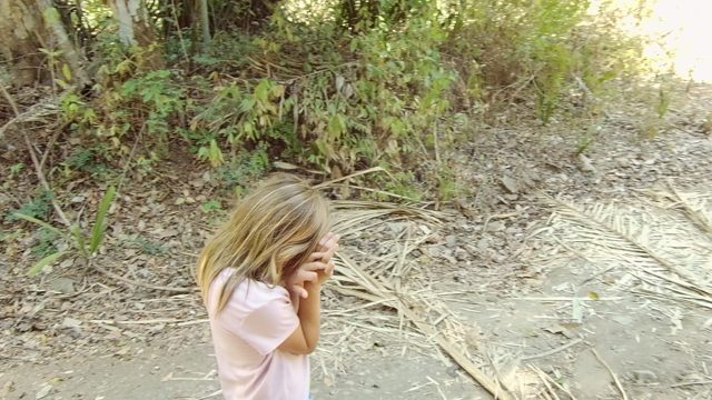 SAN PANCHO NAYARIT MEXICO-2022: Child and Adult Walking Along Forest Trail