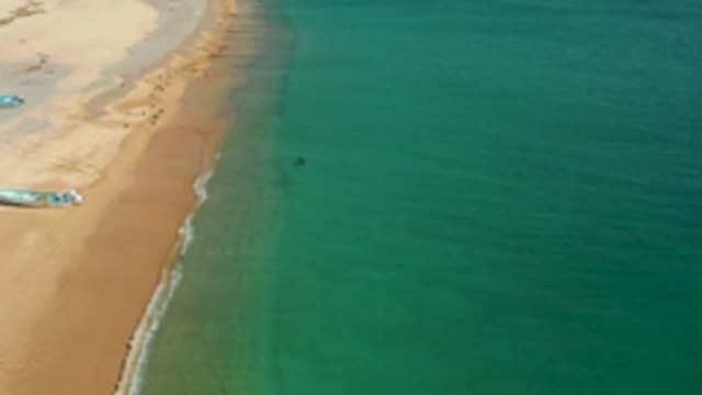 LOS FRAILES LOS CABOS BCS MEXICO-2022: Gentle Waves Lapping Sandy Beach Shoreline