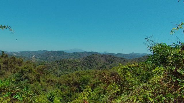 SAN PANCHO NAYARIT MEXICO-2022: Panoramic Mountain Forest View with Person Walking