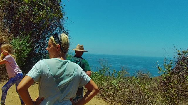 SAN PANCHO NAYARIT MEXICO-2022: Hikers on a Coastal Trail with Ocean View