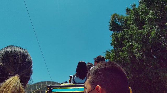 GUADALAJARA MEXICO-2022: Passengers on Open-top Vehicle Showing Hair and Mask Changes