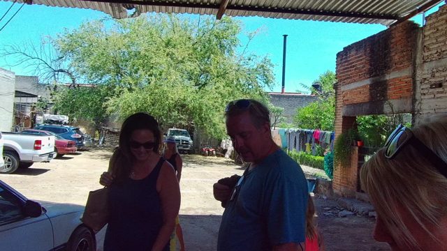 Group of People Interacting in a Residential Courtyard