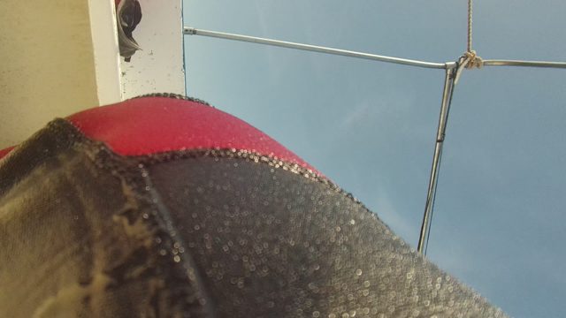Red and Black Boat Fender on Ship Deck