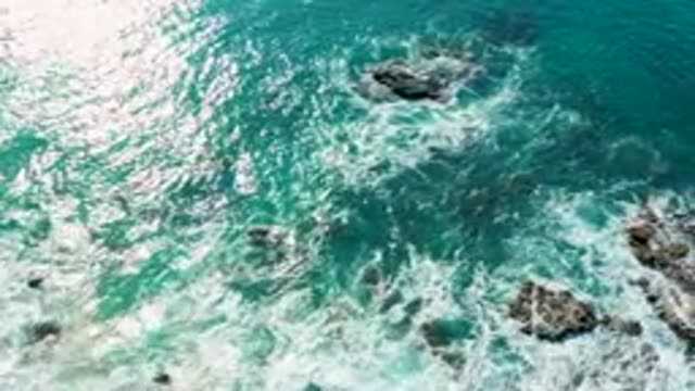 LA FORTUNA EAST CAPE BCS MEXICO-2022: Waves Crashing on Rocky Ocean Shore