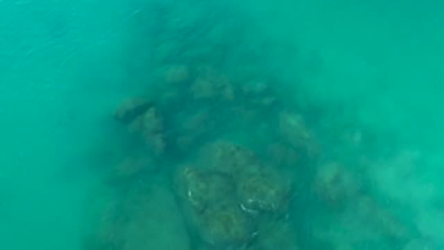 LA FORTUNA EAST CAPE BCS MEXICO-2022: Submerged Rocks Visible Through Clear Turquoise Water