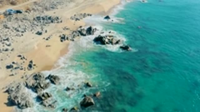 LA FORTUNA EAST CAPE BCS MEXICO-2022: Waves Breaking on Rocky Sandy Shore
