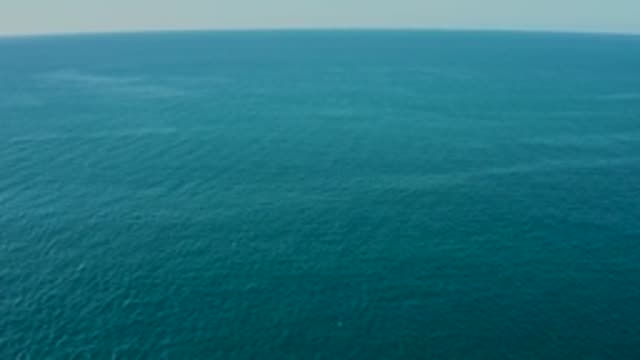 LA FORTUNA EAST CAPE BCS MEXICO-2022: Ocean Surface with Shifting Sunlight Reflections