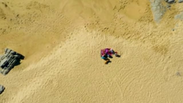 LA FORTUNA EAST CAPE BCS MEXICO-2022: Person Lying on Pink Towel on Sandy Beach