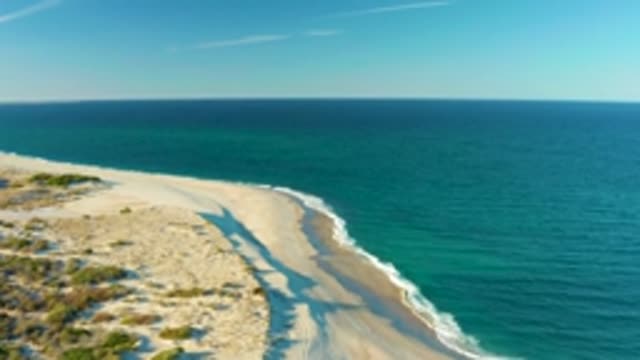 LAS BARRACAS EAST CAPE BCS MEXICO-2022: Person's Shadow Moving on Sandy Beach