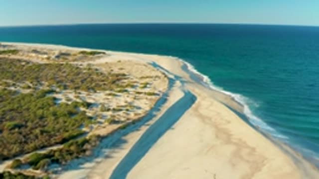 LAS BARRACAS EAST CAPE BCS MEXICO-2022: Sandy Beach and Dunes with Shifting Shadow