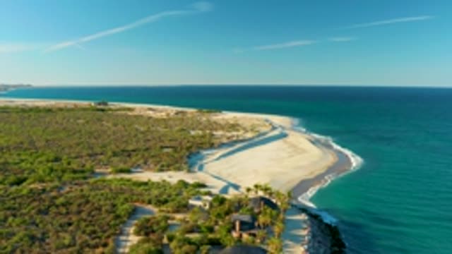 LAS BARRACAS EAST CAPE BCS MEXICO-2022: Gentle Ocean Waves on Sandy Shore