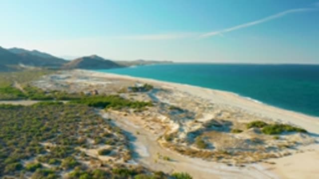 LAS BARRACAS EAST CAPE BCS MEXICO-2022: Sandy Beach with Coastal Dunes and Turquoise Ocean