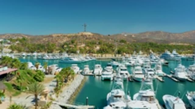 PUERTO LOS CABOS BCS MEXICO-2022: Marina with Docked Yachts and Calm Waters