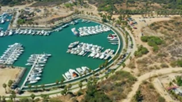 PUERTO LOS CABOS BCS MEXICO-2022: Marina Boats Departing and Road Traffic