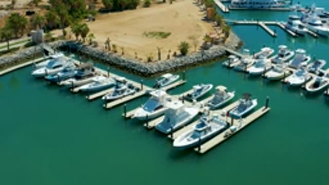 PUERTO LOS CABOS BCS MEXICO-2022: Marina with Docked Boats and Gentle Water Motion