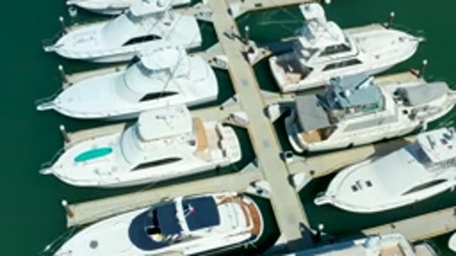 PUERTO LOS CABOS BCS MEXICO-2022: Yachts in Marina with People Walking on Dock