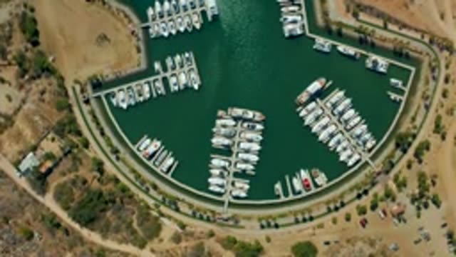 PUERTO LOS CABOS BCS MEXICO-2022: Boats in Marina Docking Area Gently Shifting