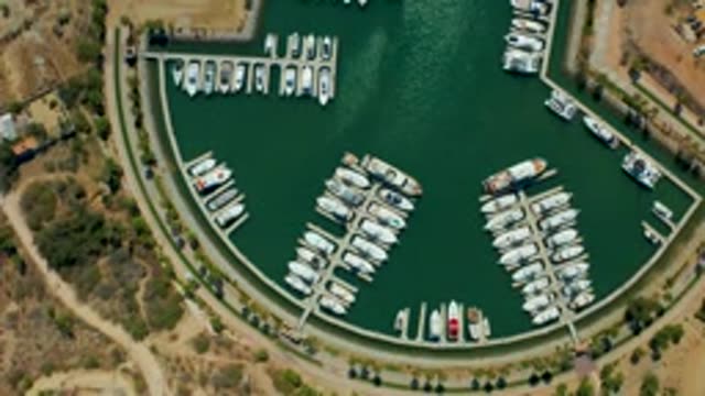 PUERTO LOS CABOS BCS MEXICO-2022: Boats Departing From a Curved Marina