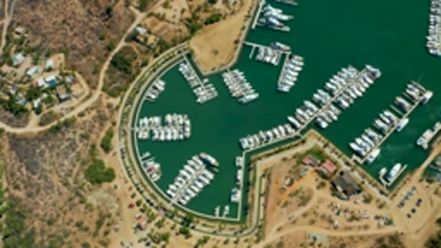 PUERTO LOS CABOS BCS MEXICO-2022: Marina with Boats Entering and Exiting Docks