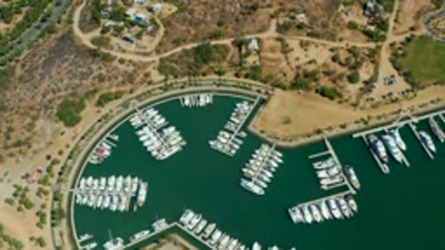 PUERTO LOS CABOS BCS MEXICO-2022: Boats Departing a Curved Marina