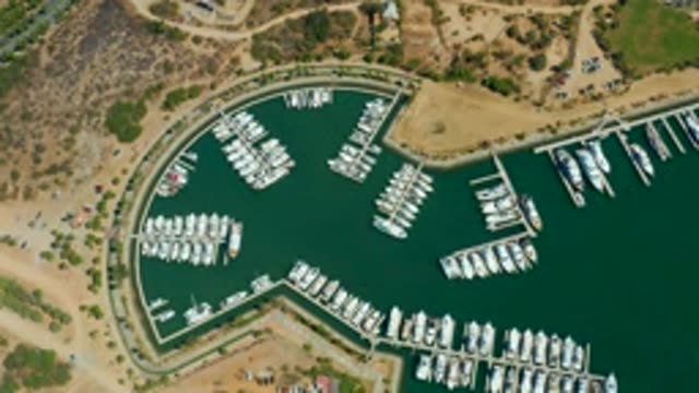 PUERTO LOS CABOS BCS MEXICO-2022: Marina with Boats and Shifting Water Ripples