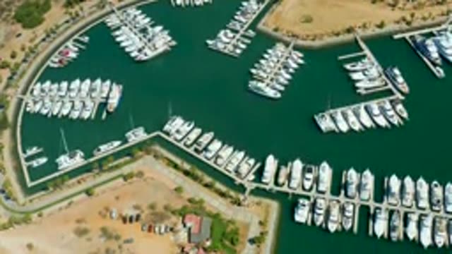 PUERTO LOS CABOS BCS MEXICO-2022: Marina Boats Navigating Docks