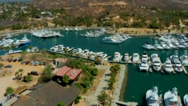 PUERTO LOS CABOS BCS MEXICO-2022: Marina Boats and Parking Lot Vehicle Movement