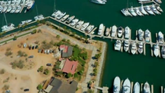 PUERTO LOS CABOS BCS MEXICO-2022: Marina Boats and Parking Lot Vehicle Movement