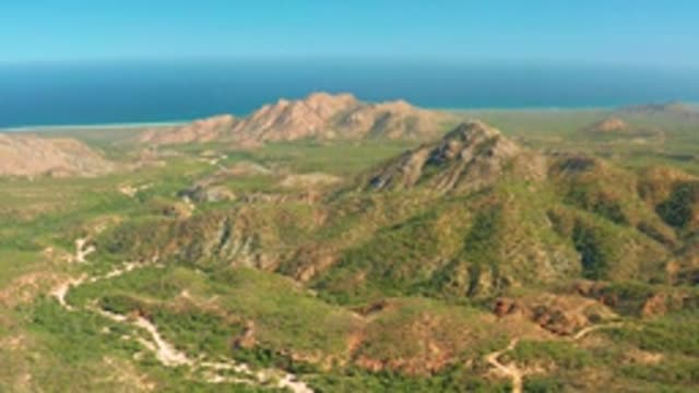 EL SALADO VIEJO LOS CABOS BCS MEXICO-2022: Coastal Mountain Range with Winding Road