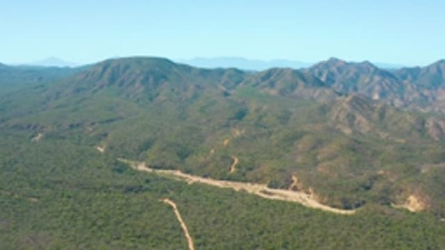 EL SALADO VIEJO LOS CABOS BCS MEXICO-2022: Vehicle Moving Through Mountain River Valley