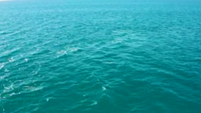 EL TULE LOS CABOS BCS MEXICO-2022: Gentle Waves on Turquoise Ocean Surface