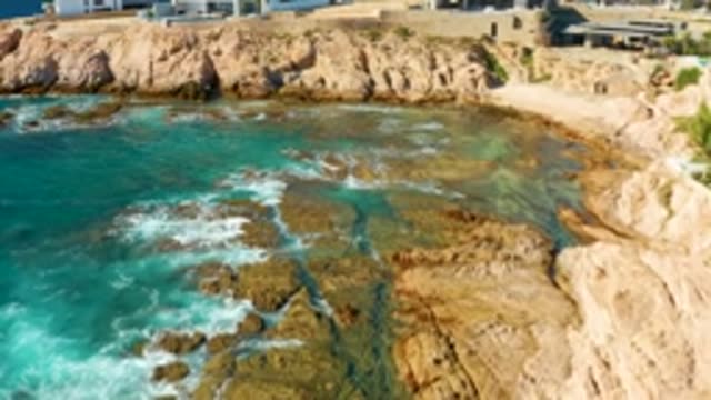 CHILENO BEACH LOS CABOS BCS MEXICO-2022: Waves Crashing on Rocky Coastline