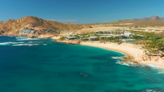 CHILENO BEACH LOS CABOS BCS MEXICO-2022: Waves Crashing on Sandy Shore From Above