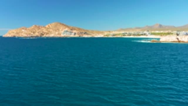 CHILENO BEACH LOS CABOS BCS MEXICO-2022: Aerial Ocean View with Coastal Town and Rocky Shore
