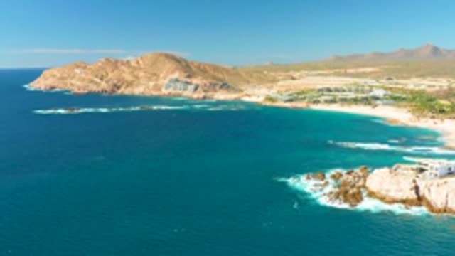 CHILENO BEACH LOS CABOS BCS MEXICO-2022: Sandy Beach and Rocky Coastline with Ocean Waves